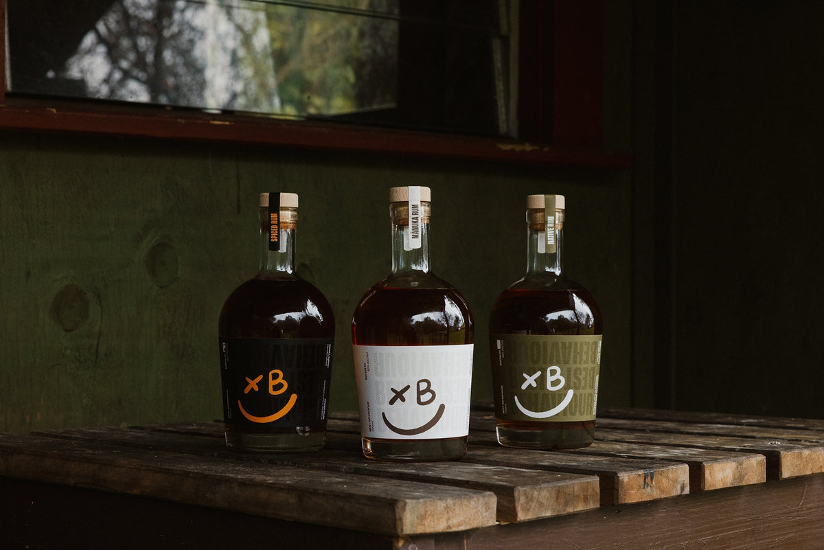 Best Behaviour Native Botanical, Spiced, and Manuka Smoked Rum bottles from Mount Maunganui, New Zealand