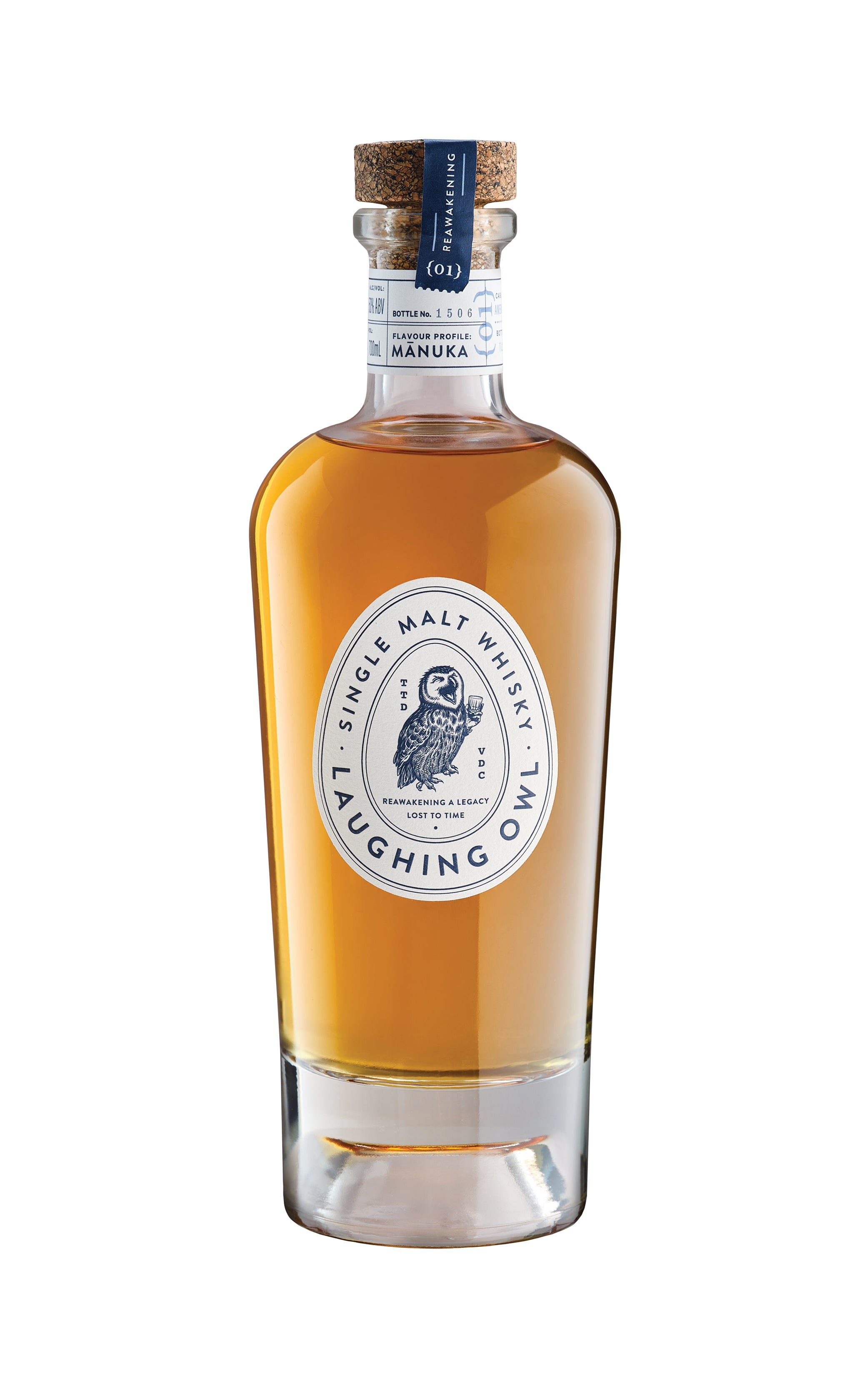 Bottle of Laughing Owl Single Malt Whiskey on a white background