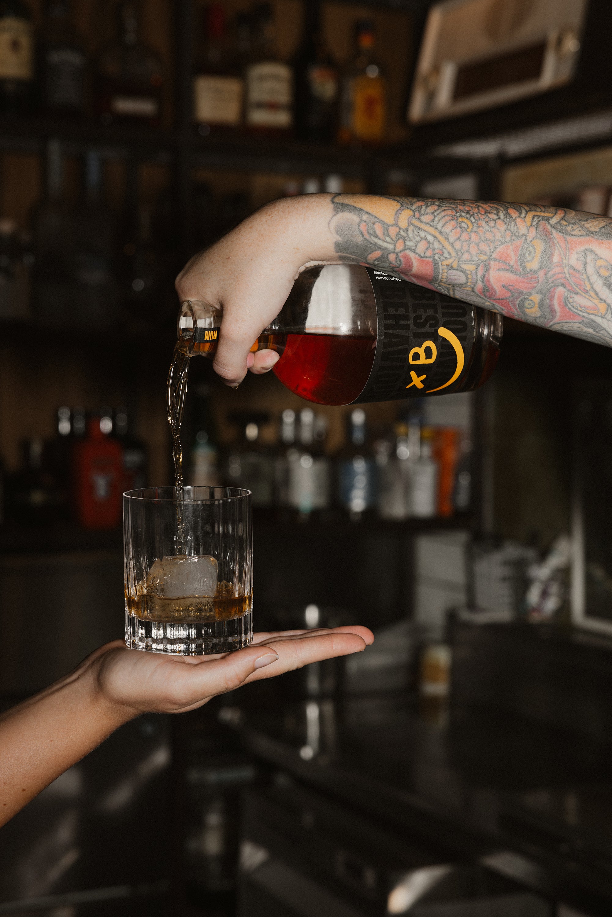 Best Behaviour Spiced Rum in a cocktail setting — smooth, bold New Zealand rum aged in ex-bourbon barrels
